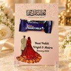 Baat Pakki card with bride groom illustration, calligraphy and Dairy Milk chocolate