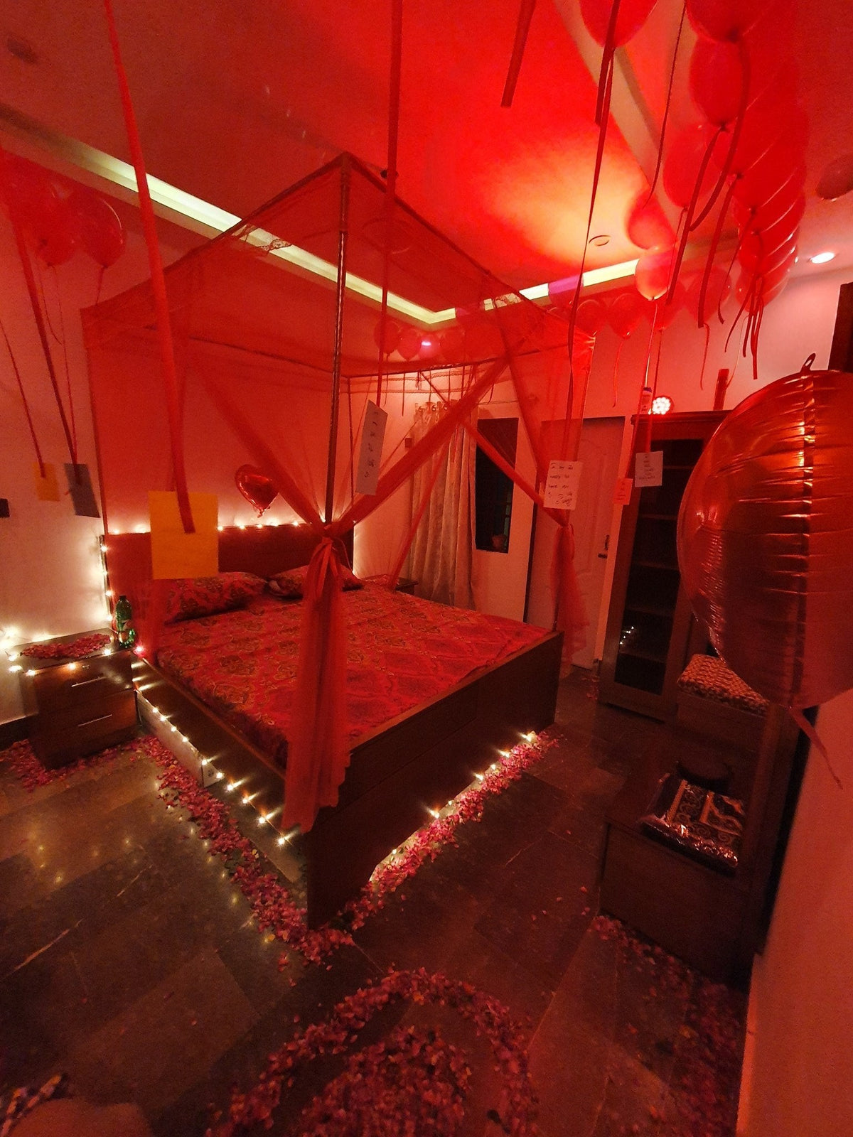 Classic bed net wedding room decoration Karachi with balloons and fairy lights – image 3