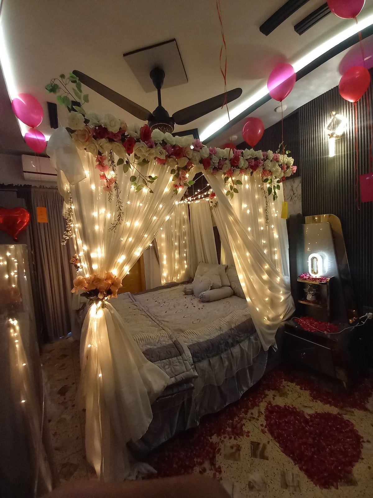 Classic red and white curtain wedding room decor Karachi floral setup – image 1