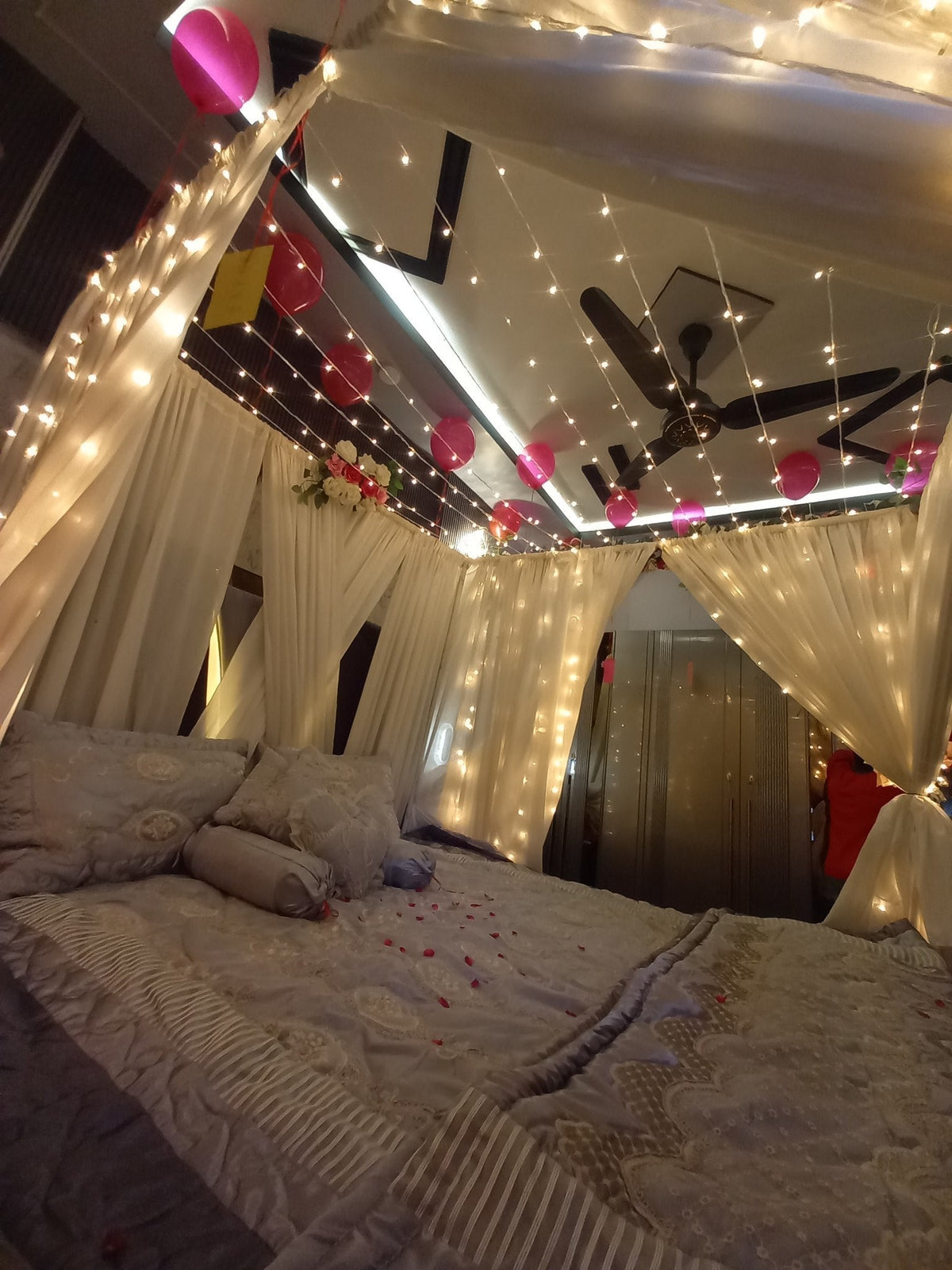 Classic red and white curtain wedding room decor Karachi floral setup – image 2