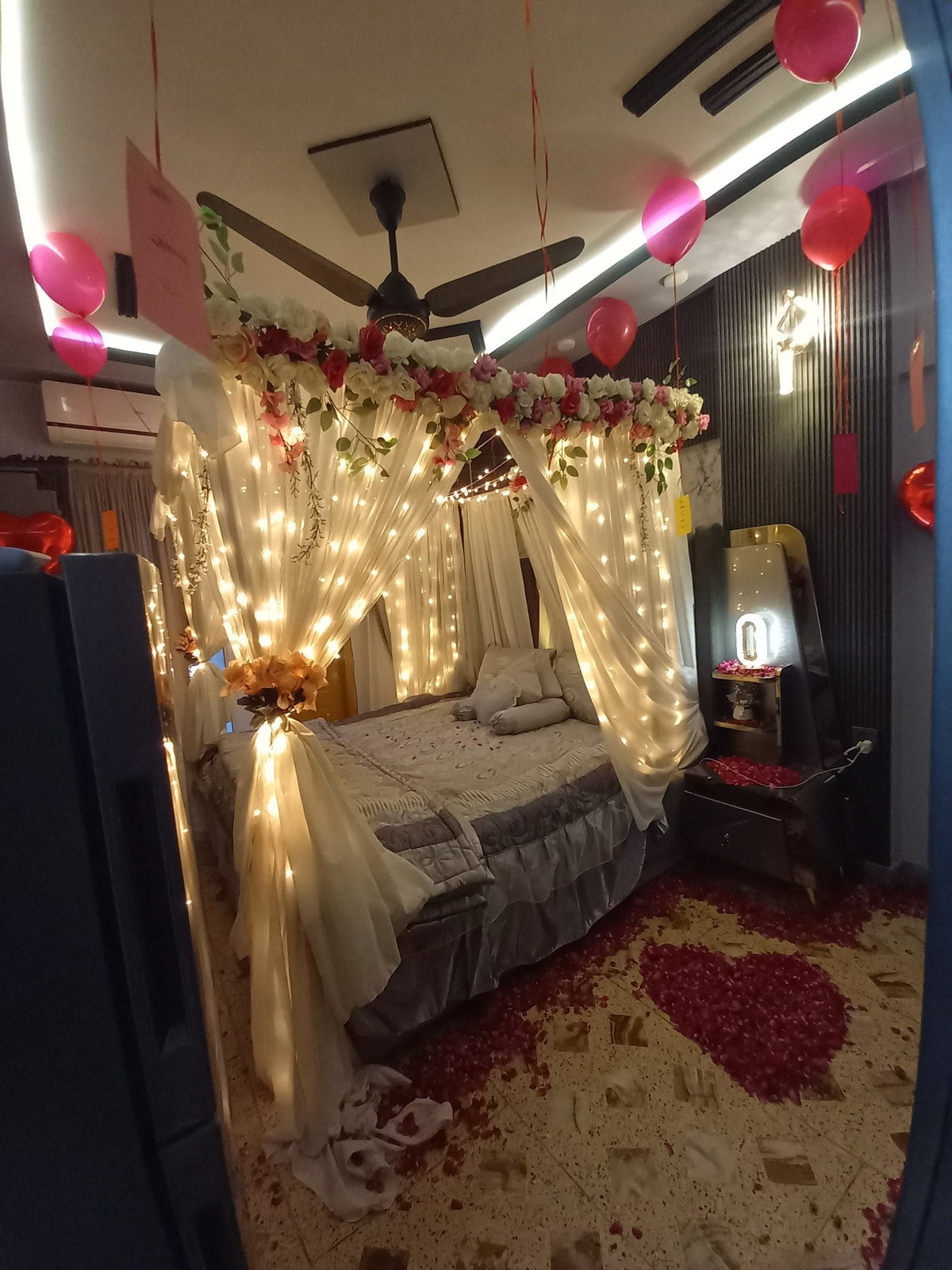 Classic red and white curtain wedding room decor Karachi floral setup – image 3