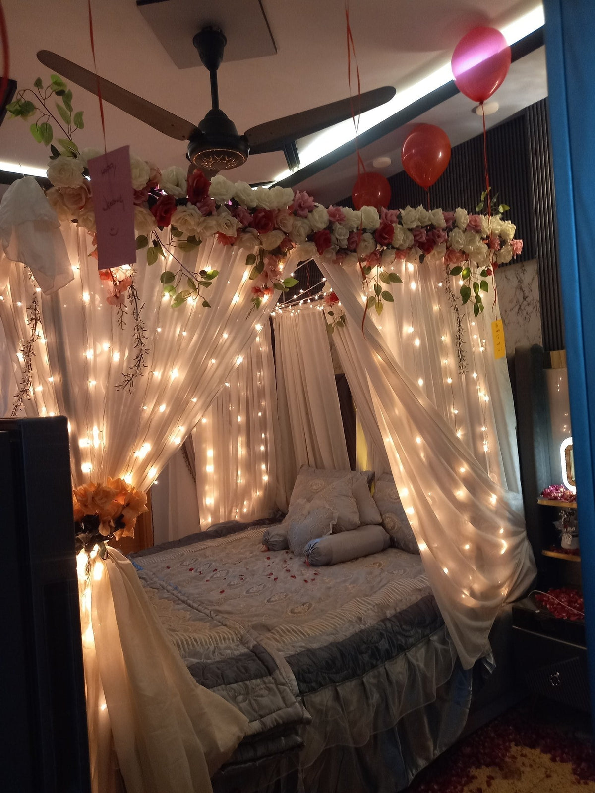 Classic red and white curtain wedding room decor Karachi floral setup – image 5