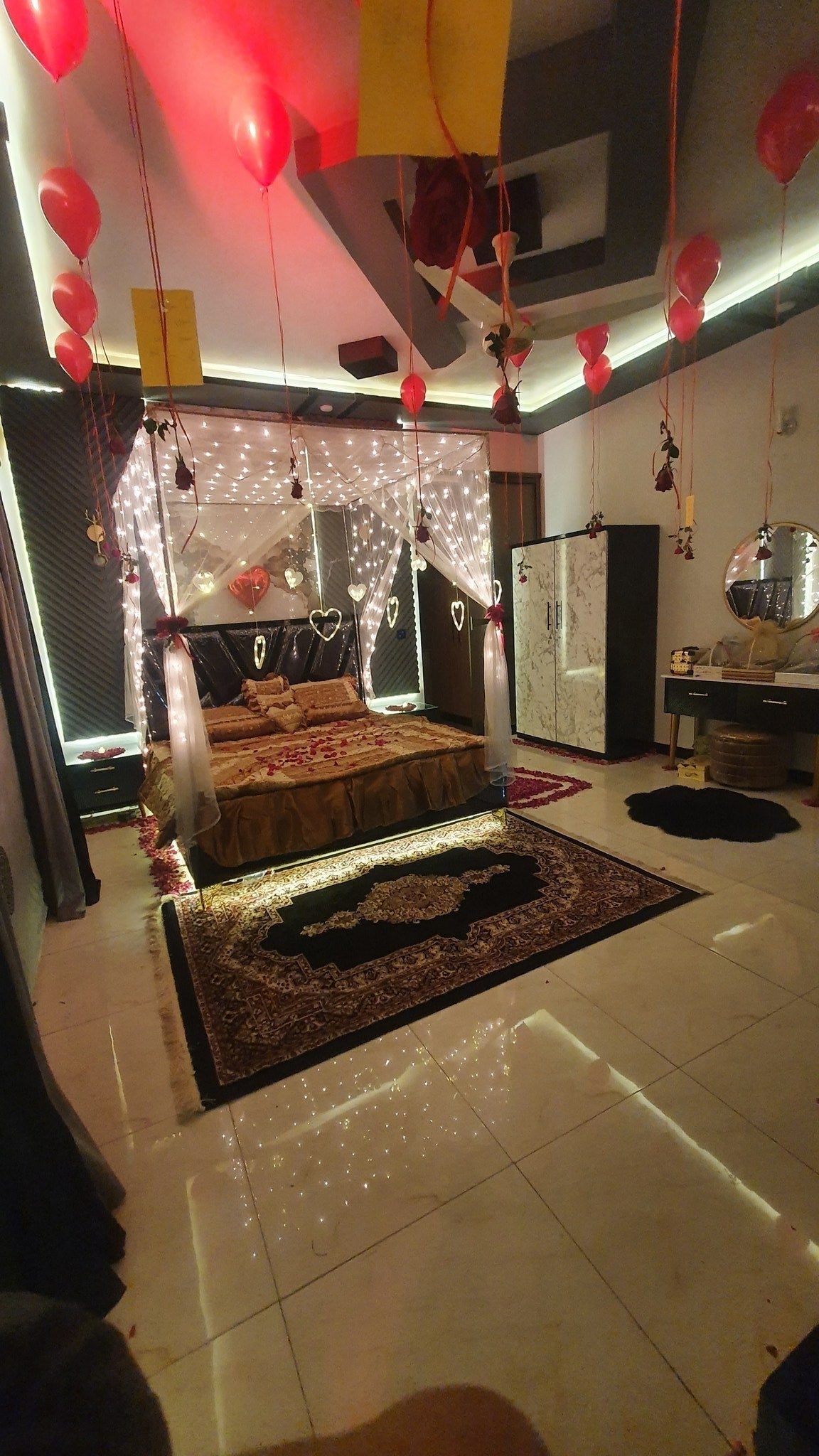 Hanging real flowers wedding room decor Karachi with white net and fairy lights – image 5