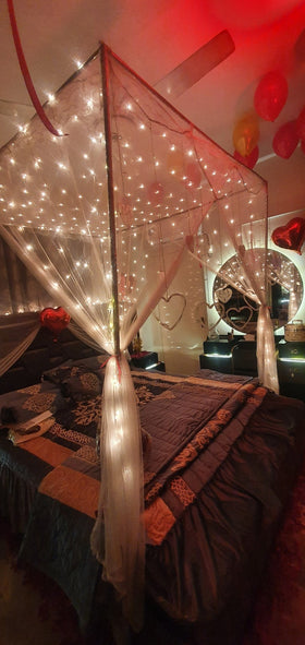 Heart foil balloons wedding room decor Karachi with love notes and rose petals – image 1