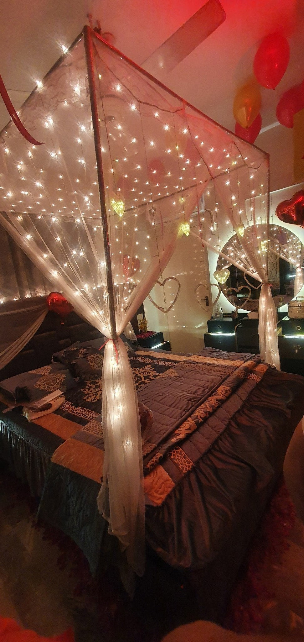 Heart foil balloons wedding room decor Karachi with love notes and rose petals – image 2