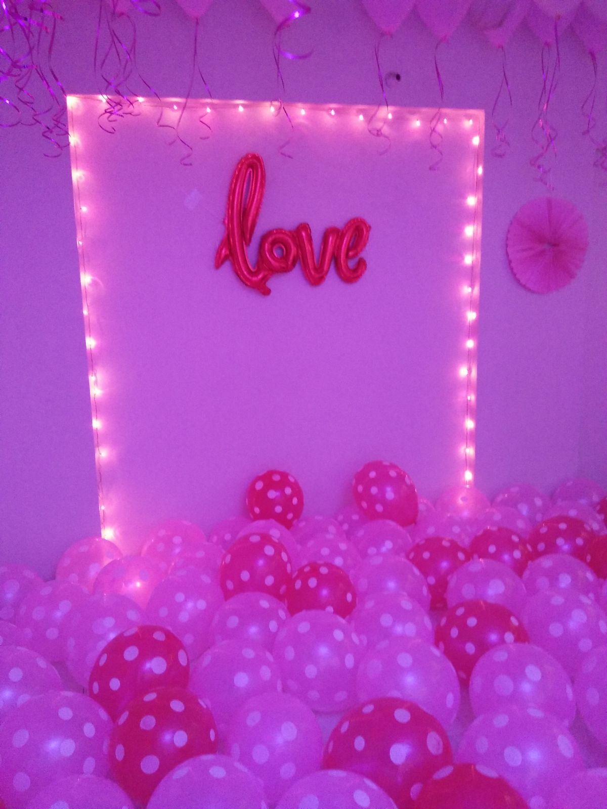 Love Theme Birthday Surprise – Pink Balloon Floor, Fairy Light Love Board & Photo String