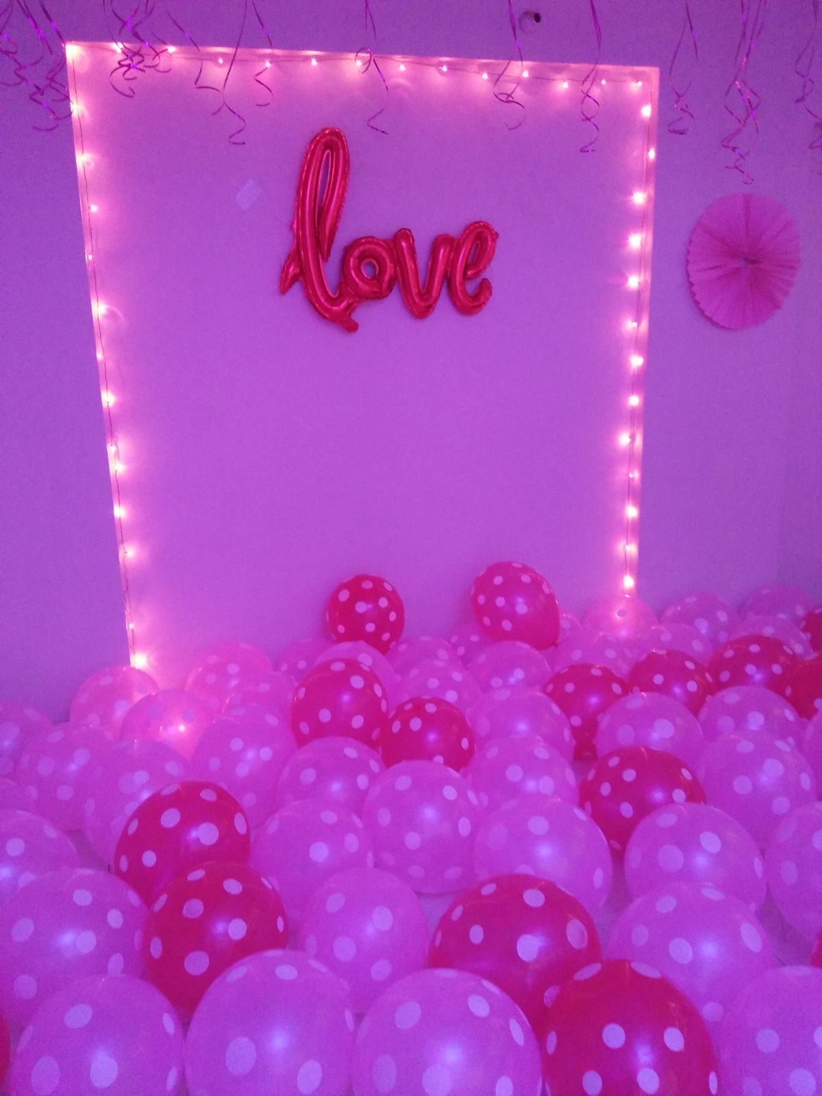 Love Theme Birthday Surprise – Pink Balloon Floor, Fairy Light Love Board & Photo String