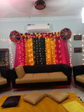 Dholki decoration at home Karachi with pink yellow green fairy light curtain backdrop – image 1