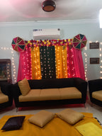 Dholki decoration at home Karachi with pink yellow green fairy light curtain backdrop – image 1
