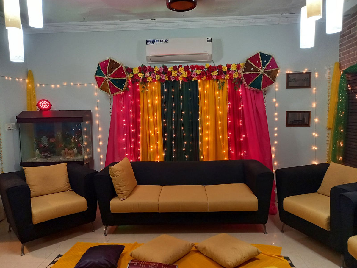 Dholki decoration at home Karachi with pink yellow green fairy light curtain backdrop – image 2