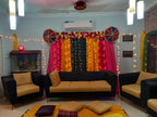 Dholki decoration at home Karachi with pink yellow green fairy light curtain backdrop – image 3