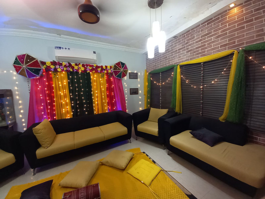 Dholki decoration at home Karachi with pink yellow green fairy light curtain backdrop – image 5