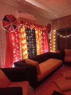 Dholki decoration at home Karachi with pink yellow green fairy light curtain backdrop – image 8