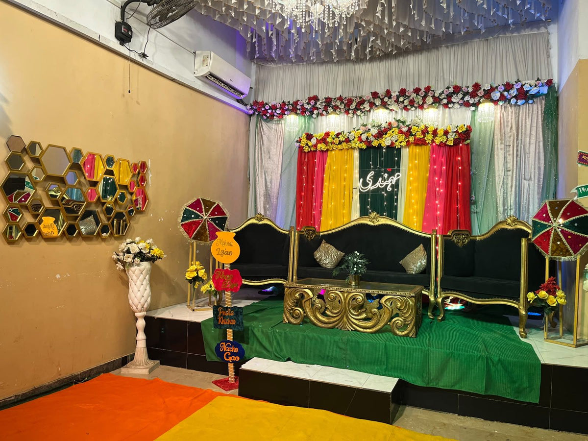 Mehndi night decoration Karachi with neon sign floral topper and fairy light curtains – image 5