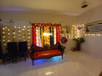 Mayun decoration Karachi with neon sign fairy light walls and colourful curtain backdrop – image 3