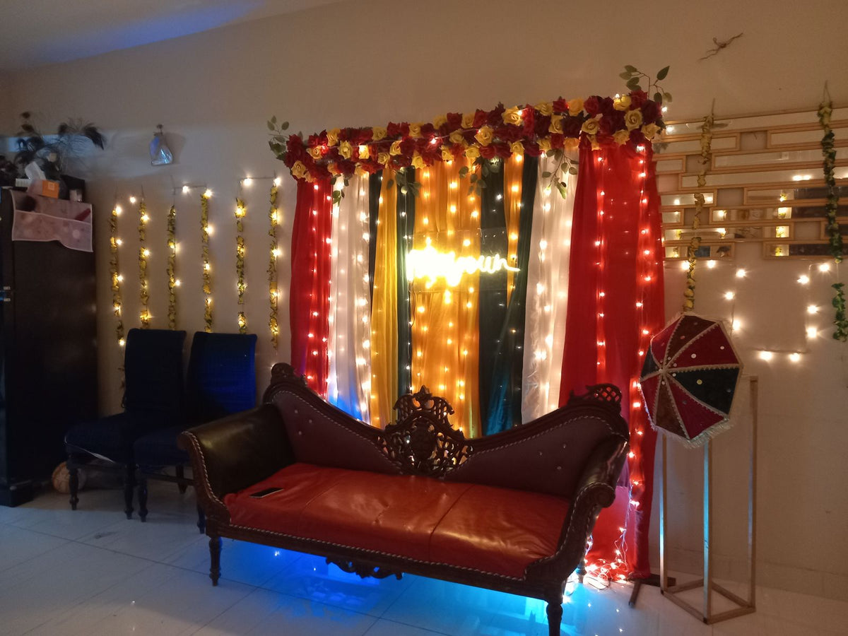 Mayun decoration Karachi with neon sign fairy light walls and colourful curtain backdrop – image 6
