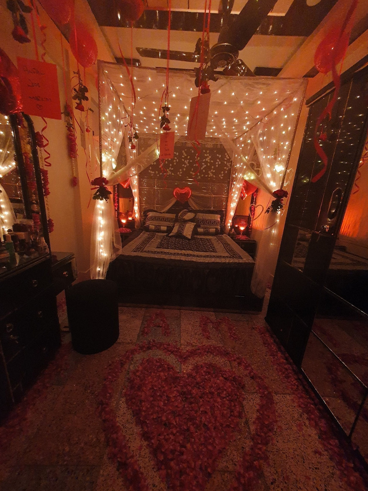 Real flowers hanging wedding room decor Karachi with white net and fairy lights – image 1