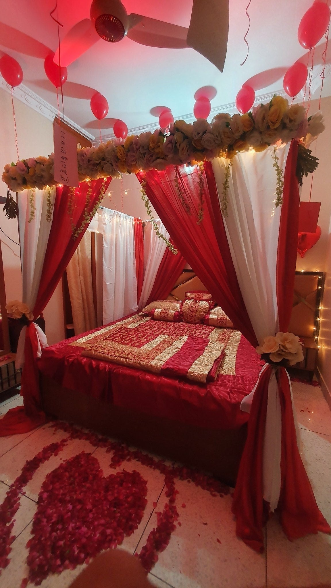 Red and white curtain wedding room decoration Karachi with artificial flowers – image 1