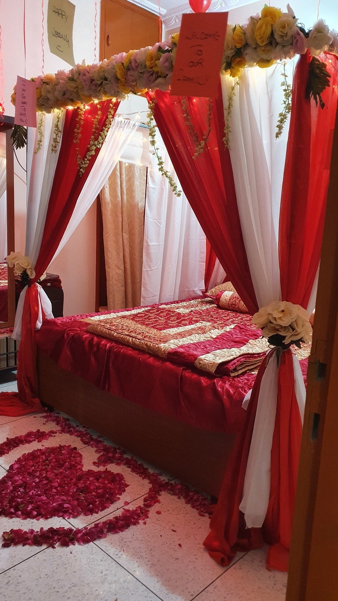 Red and white curtain wedding room decoration Karachi with artificial flowers – image 3