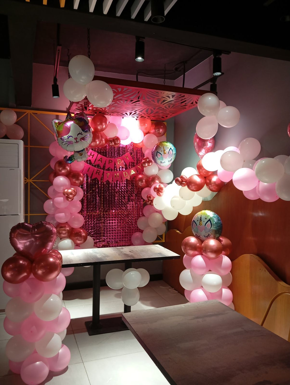 Restaurant Birthday Decor – Pink & White Balloon Pillars with Fringe Curtain Backdrop
