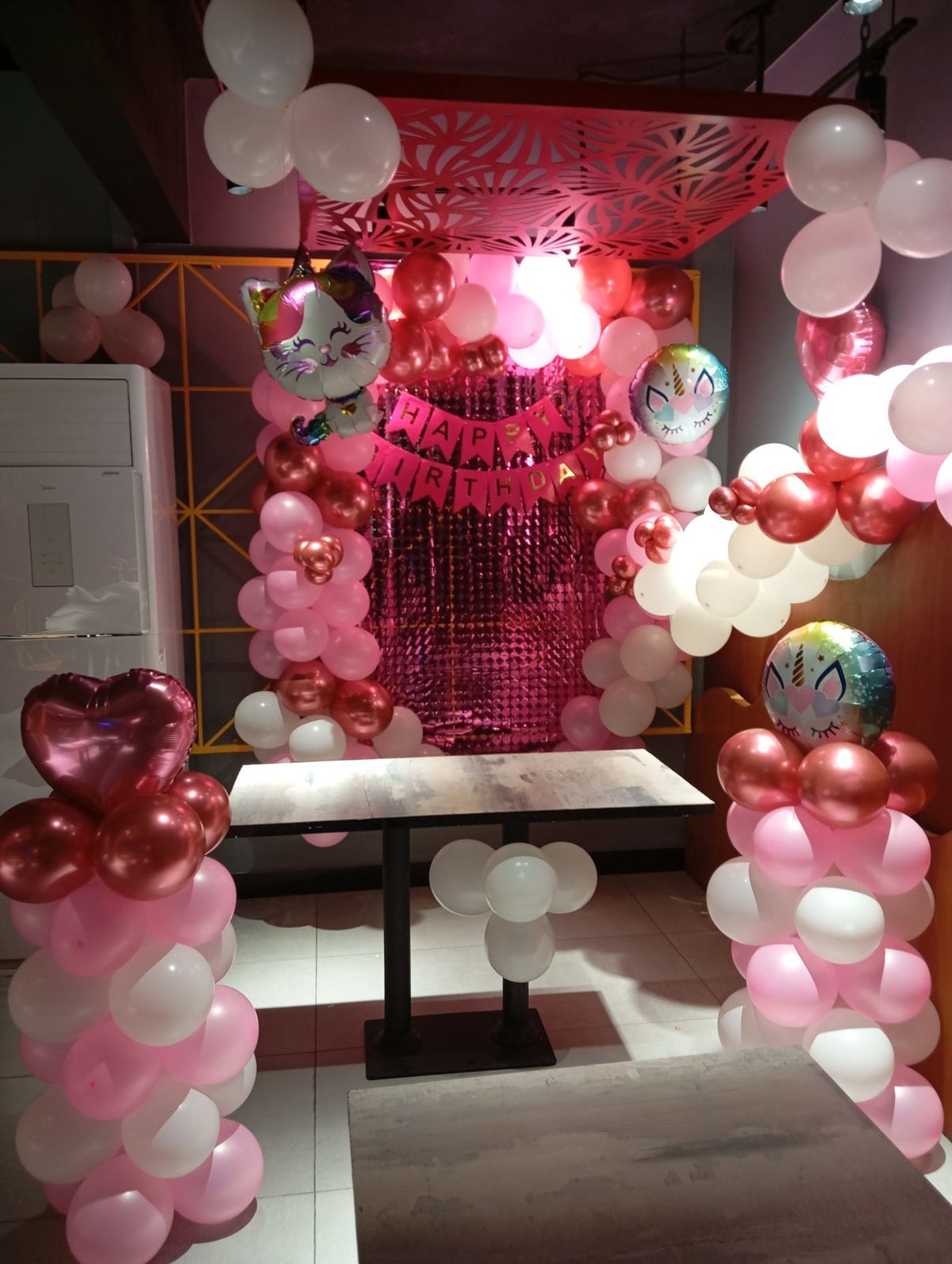 Restaurant Birthday Decor – Pink & White Balloon Pillars with Fringe Curtain Backdrop