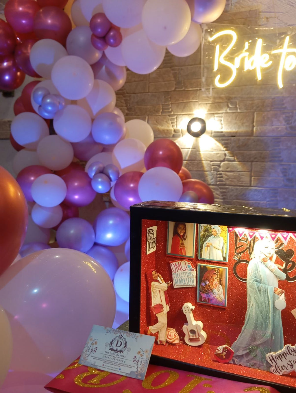 Rooftop bridal shower decoration Karachi with bride to be neon sign, pink balloon garland and fairy lights – image 9