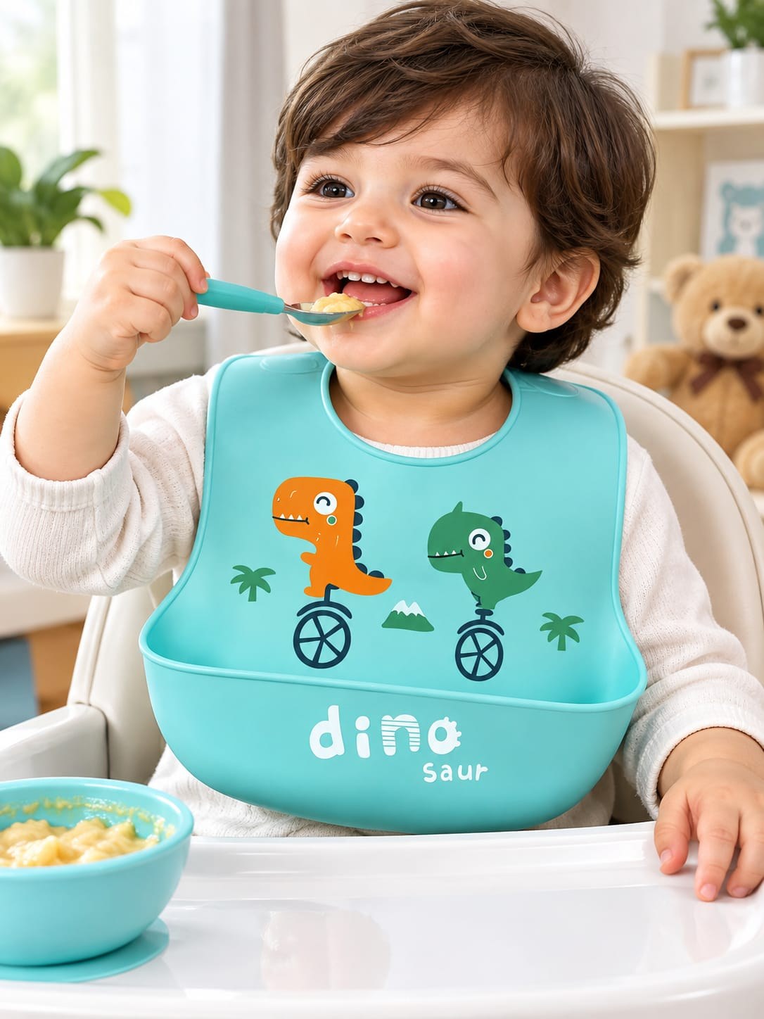 silicone baby bib dino teal with food catcher pocket