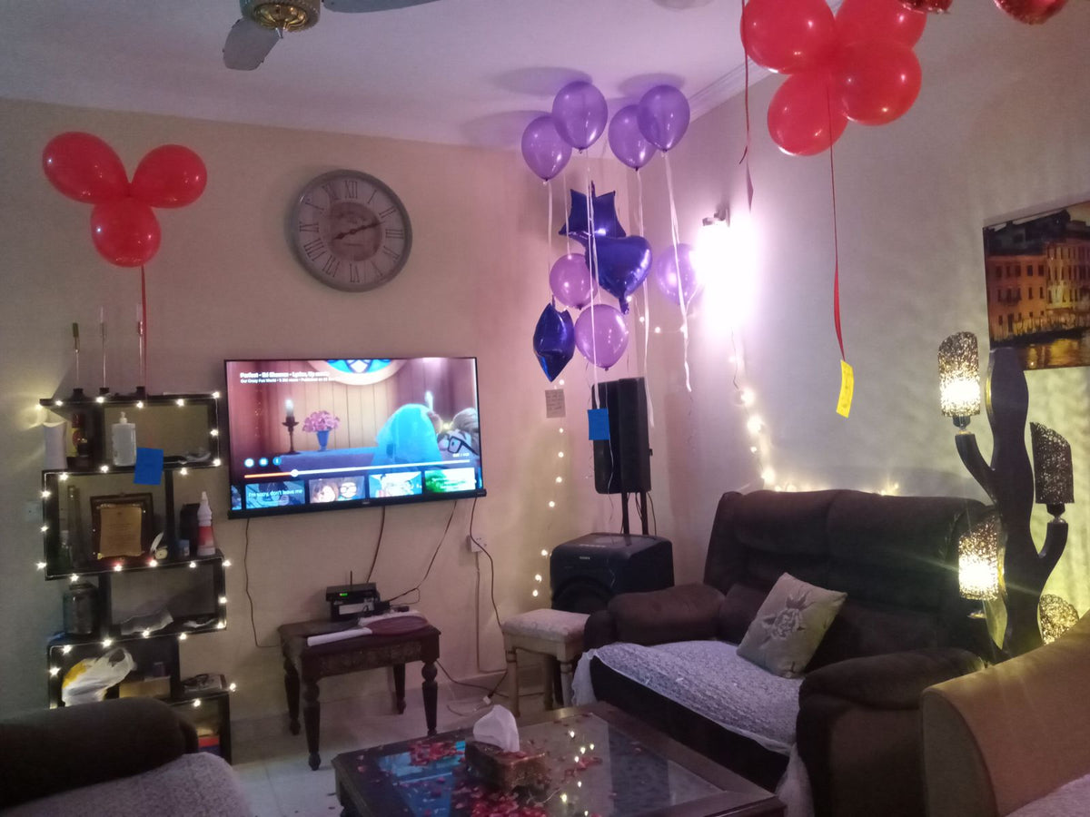 I am sorry surprise decoration Karachi with rose petal message and heart balloon pathway – image 3