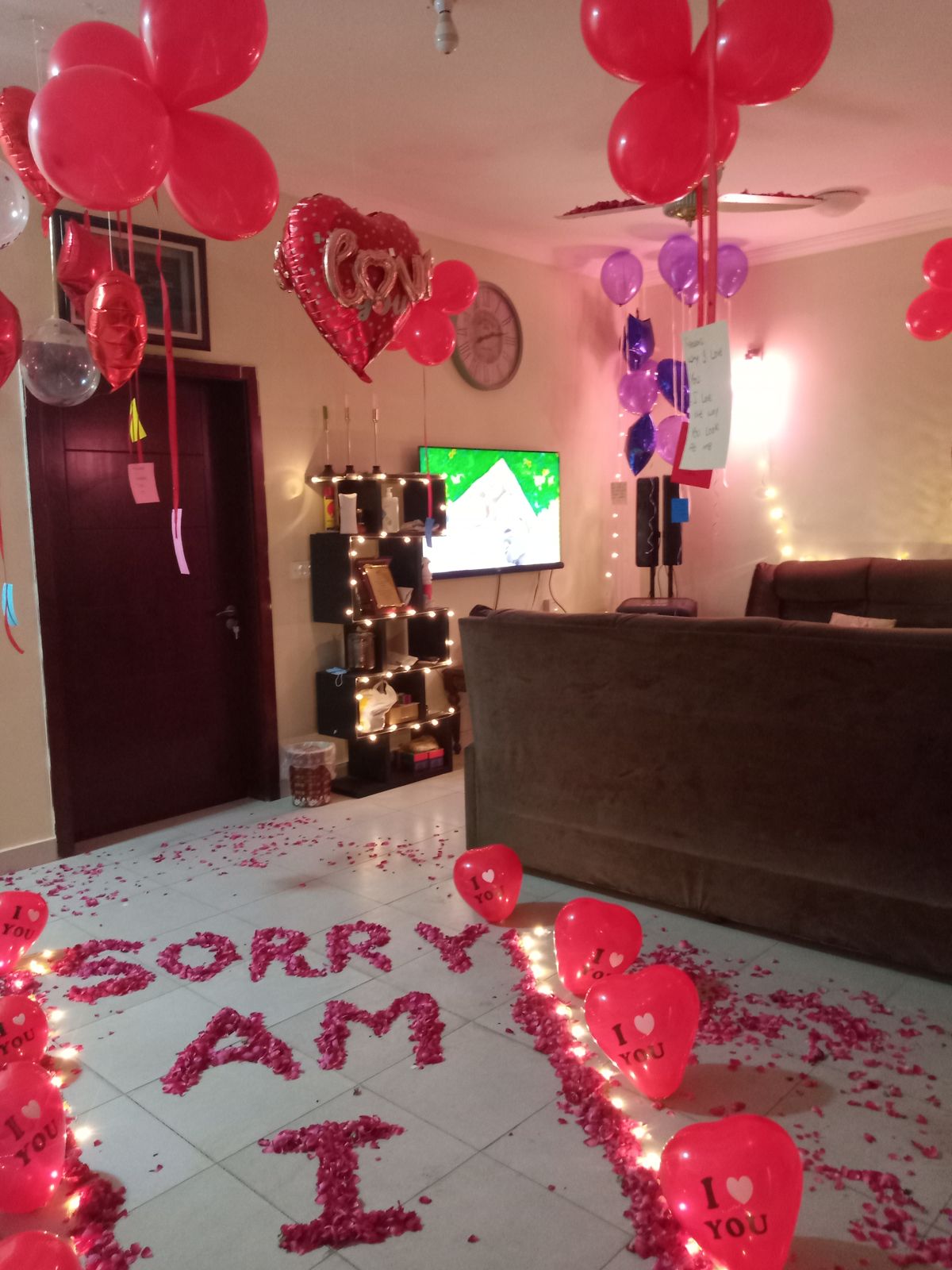 I am sorry surprise decoration Karachi with rose petal message and heart balloon pathway – image 4