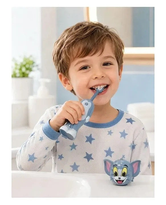 boy brushing teeth with tom and jerry kids toothbrush