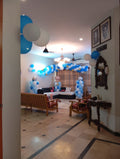 Welcome Home Baby Boy Decor – Blue & White Balloon Garland Lounge & Bedroom Setup