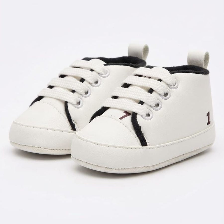 White Classic Lace-Up Baby Sneakers close-up view – soft sole baby shoes – Belinda Store