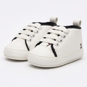 White Classic Lace-Up Baby Sneakers close-up view – soft sole baby shoes – Belinda Store